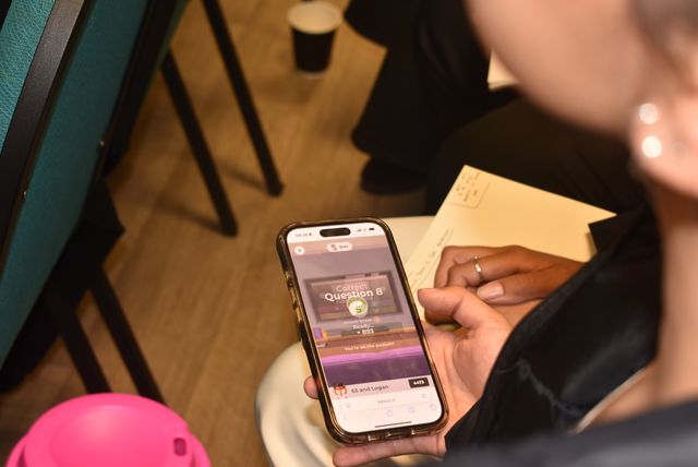 Participant looking at their phone